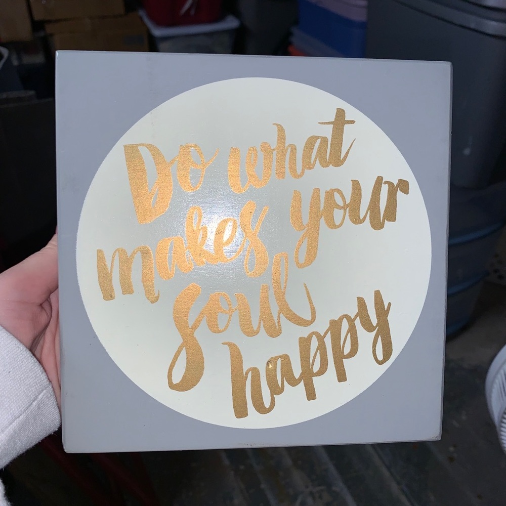 “Do what makes your soul happy” wall sign